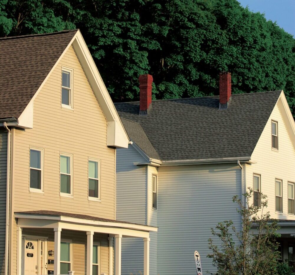 Two houses representing how to apply for a second mortgage